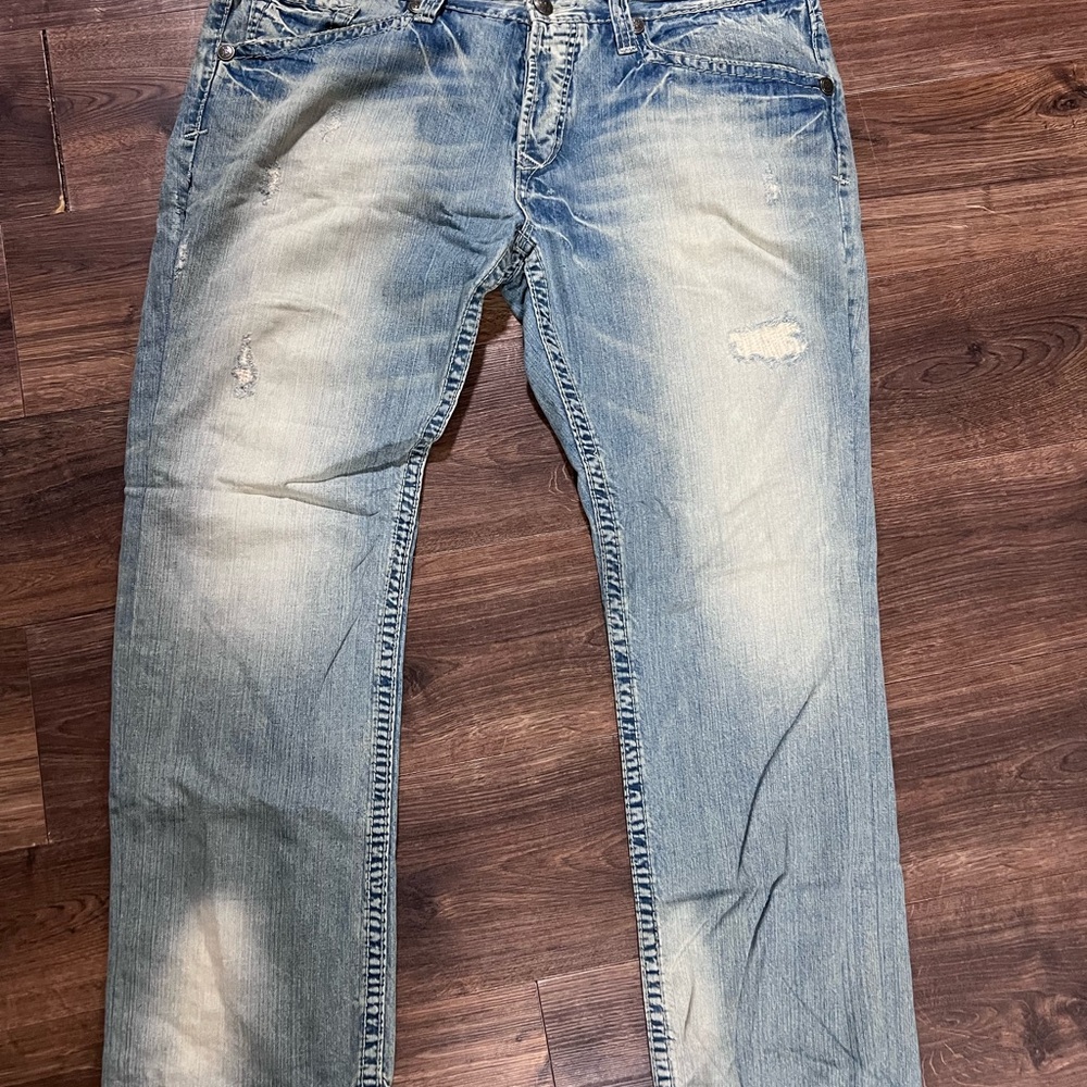 Vintage Rivet de Cru Men's Distressed Light Blue Jeans size 42W x 32L.